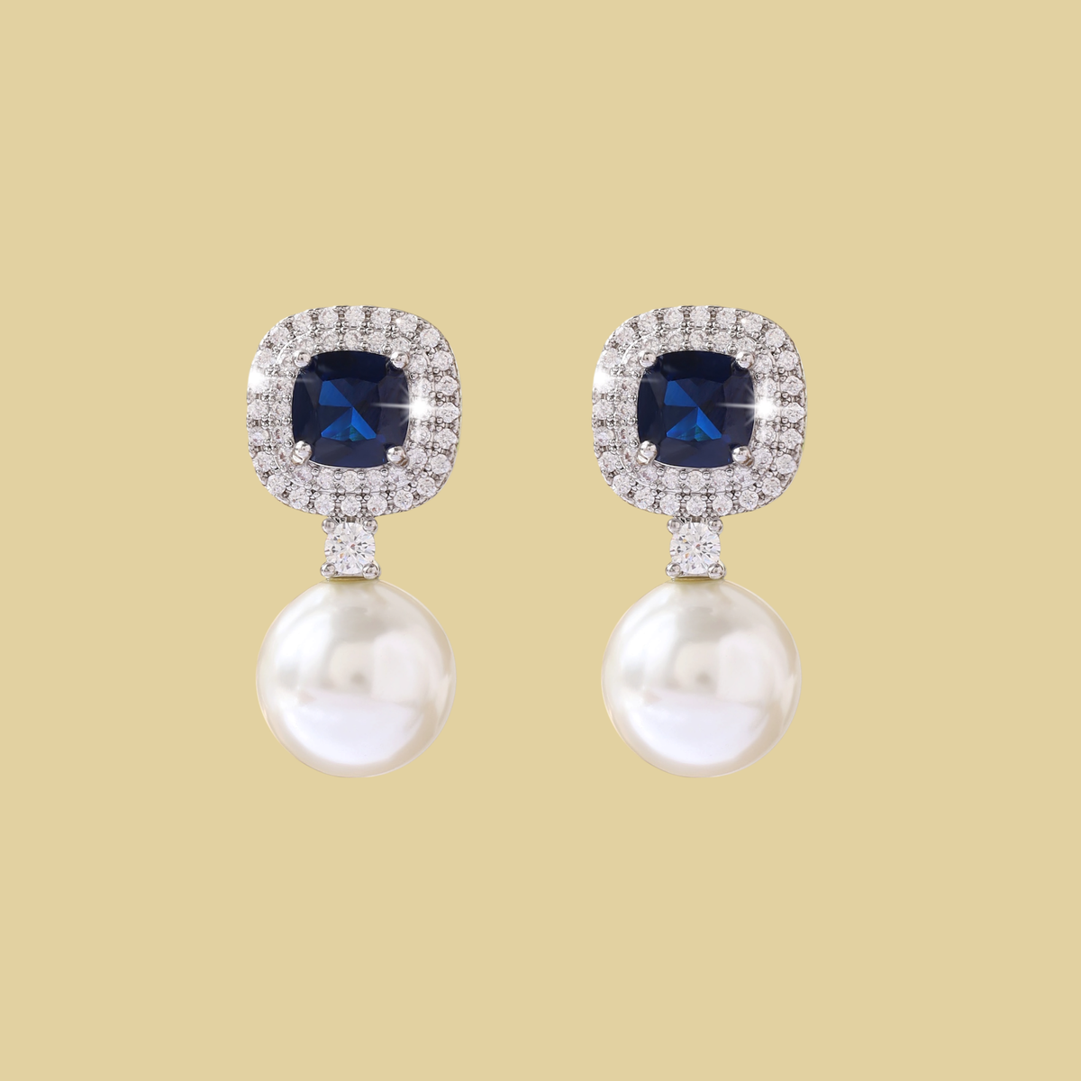 ARETES DE PIEDRA AZUL Y DIJE DE PERLA