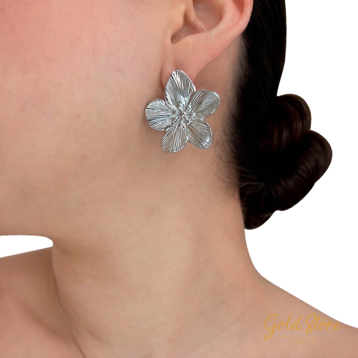 ARETES FLOR CON TEXTURA