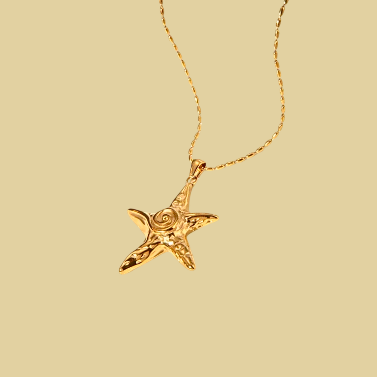 COLLAR ESTRELLA DE MAR DORADA