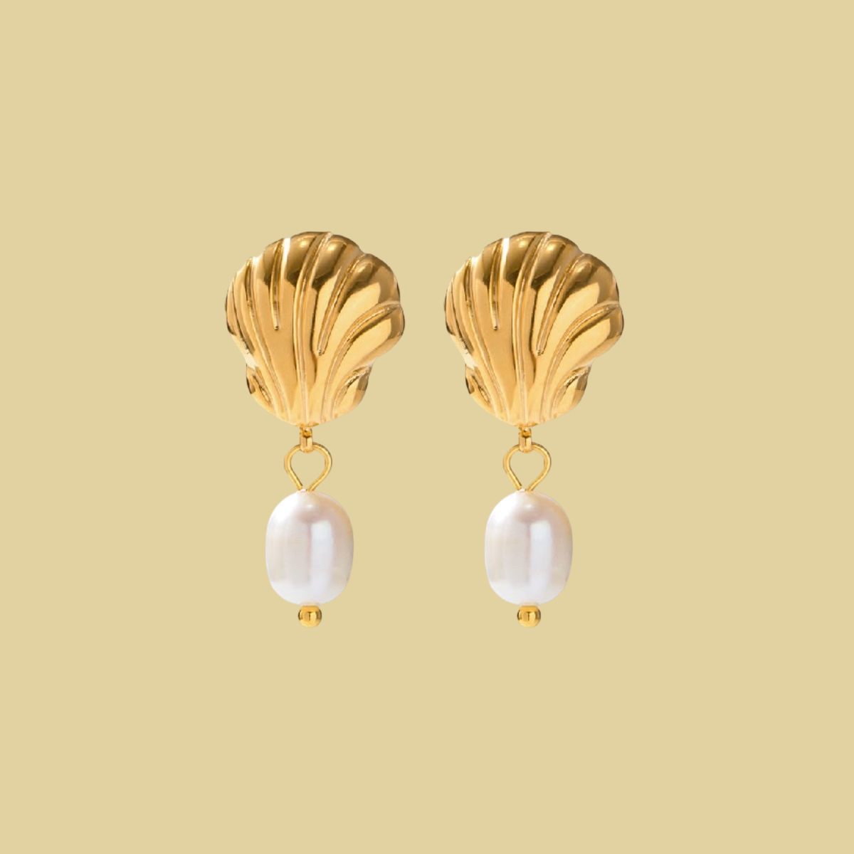 ARETES CON CONCHITA Y PERLITA COLGANDO