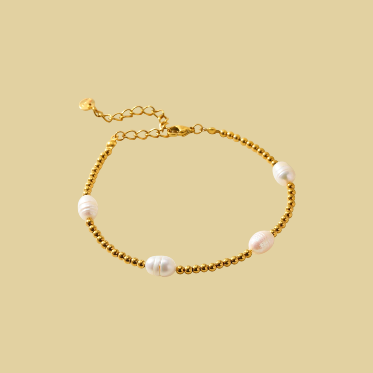PULSERA BOLITAS CON 4 PERLITAS