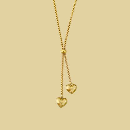 COLLAR CORBATIN CORAZONES COLGANDO